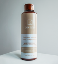 Levane clarifying shampoo bottle on a gray background
