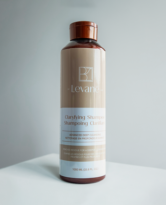 Levane clarifying shampoo bottle on a gray background