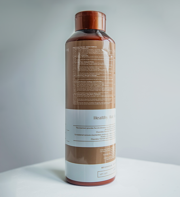 Levane clarifying shampoo bottle on a gray background