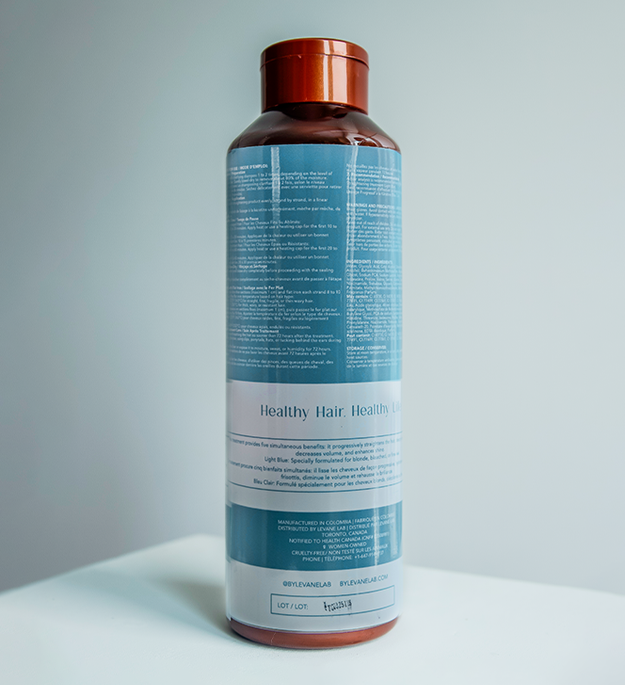 Bottle of Levane Light Blue product on a light gray background