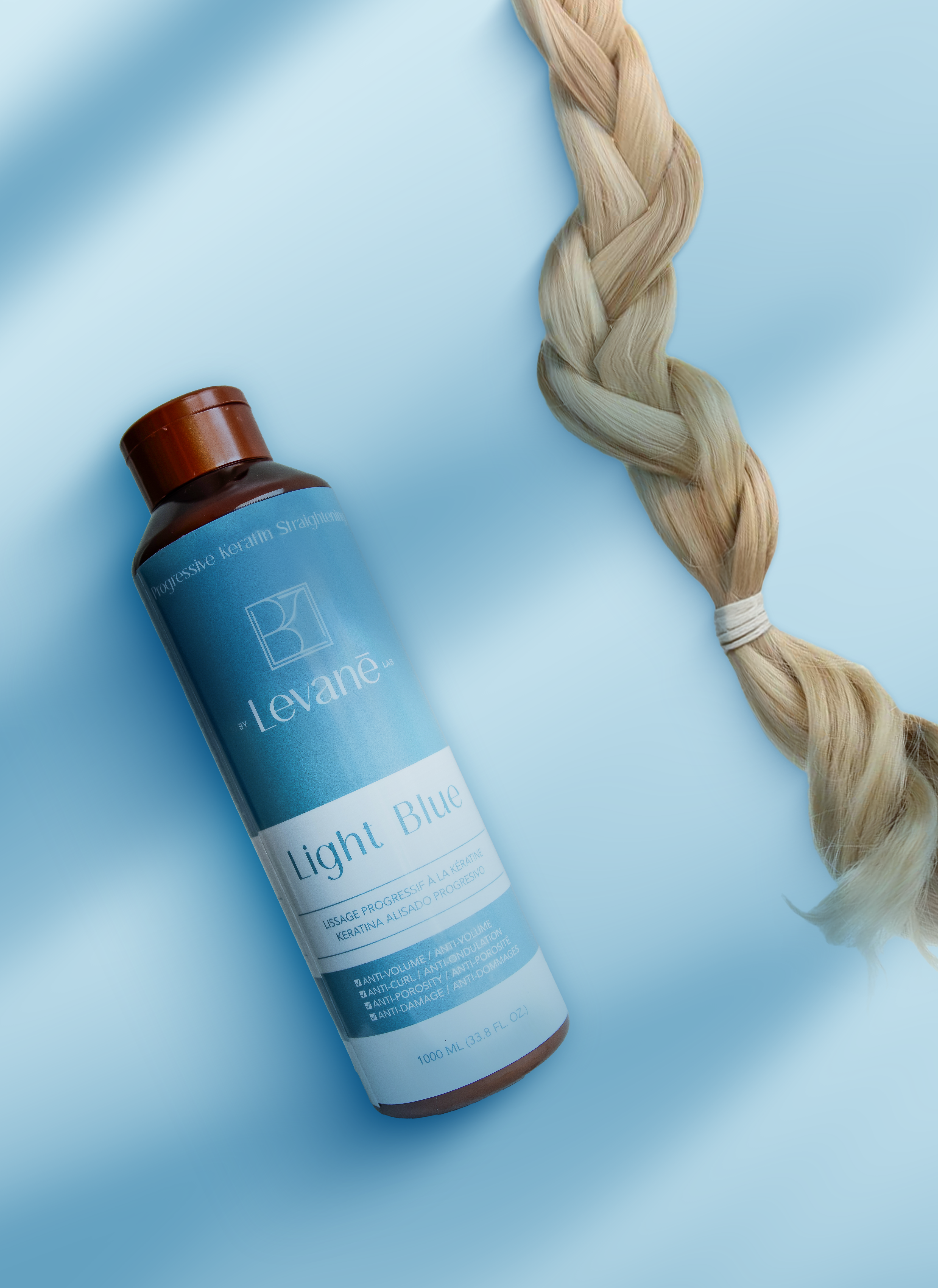 Levane hair product bottle with a blonde hair on a light blue background